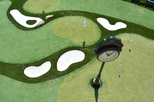 Toronto Synthetic grass golf course with sand traps and golfers